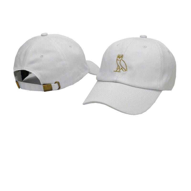 White cap with golden logo