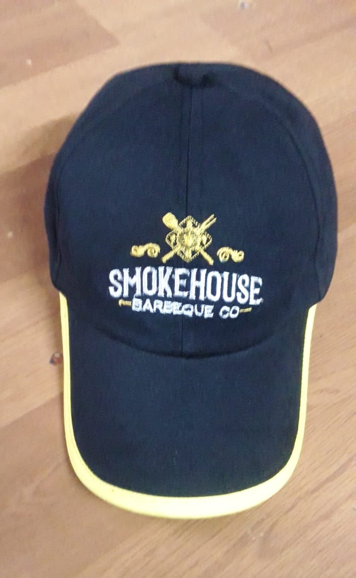 Blue cap with yellow border